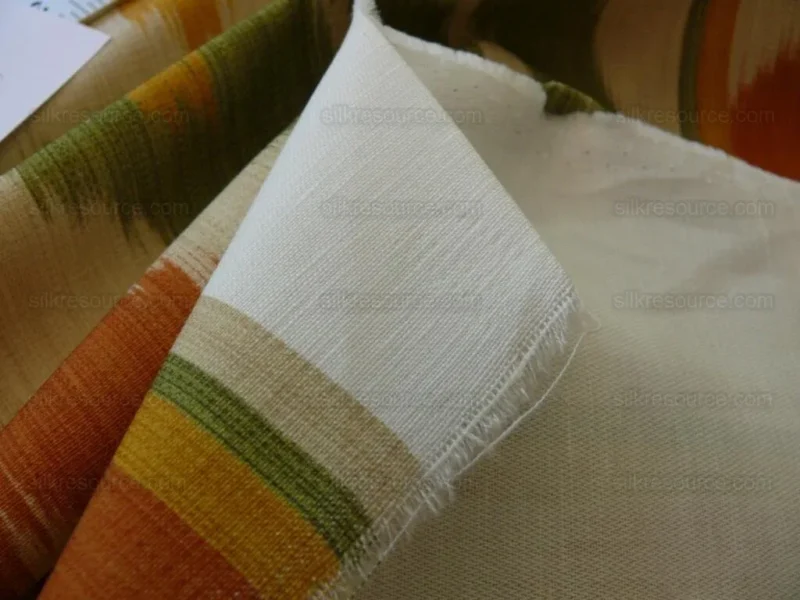 P1580710.jpg By Yd Clarence House Grand Pamir Ikat Linen Rust & Fern Green MSRP USD 370/yard