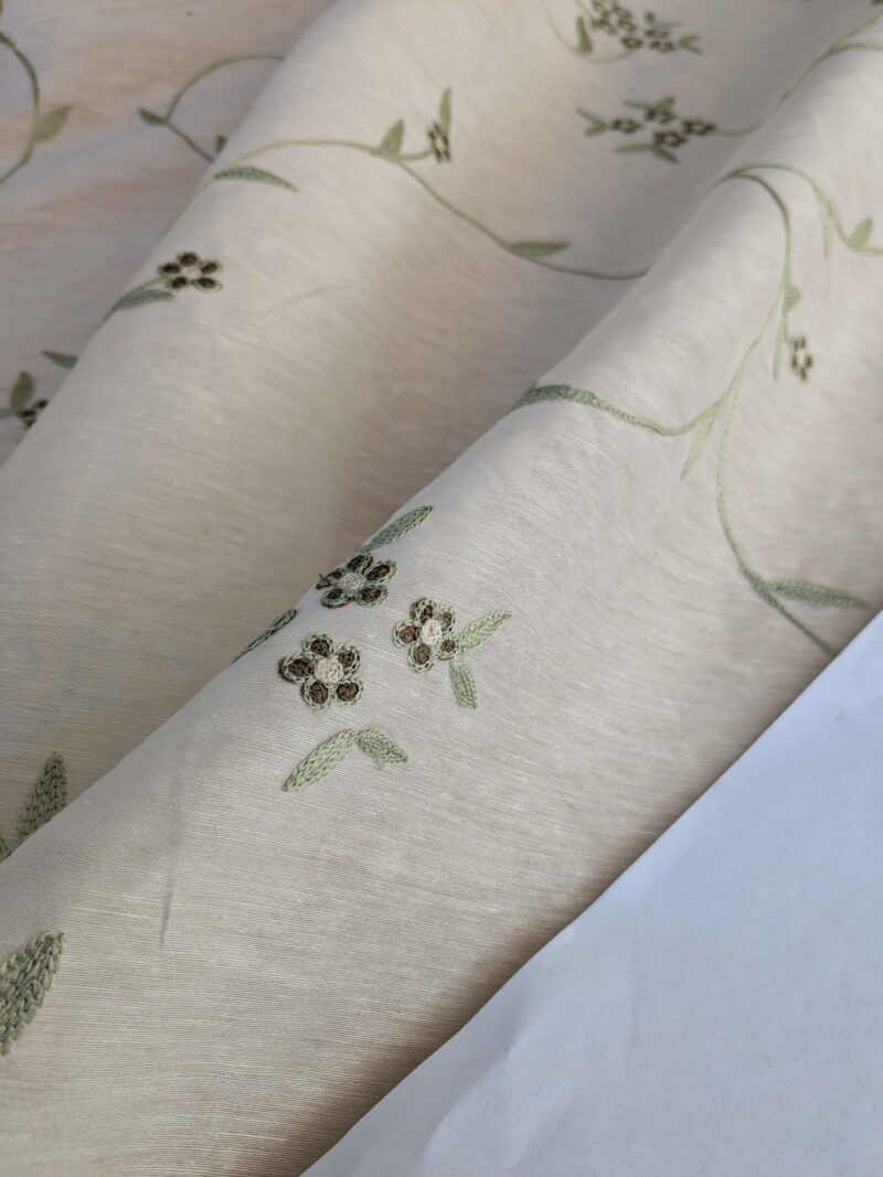 PXL_20241009_181716963 by yard Scalamandre Nirali Endive Dreamy Silk Linen Sheer with Embroidery Green on White Floral Silk Linen MSRP USD 238/y