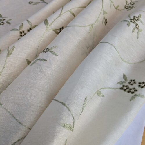 PXL_20241009_181815325 by yard Scalamandre Nirali Endive Dreamy Silk Linen Sheer with Embroidery Green on White Floral Silk Linen MSRP USD 238/y
